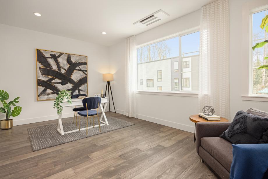 Large flex space on the main living level could be used as an office