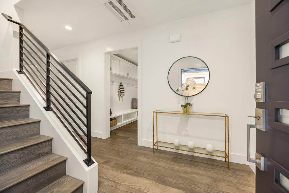 Entry foyer with drop zone off of the garage