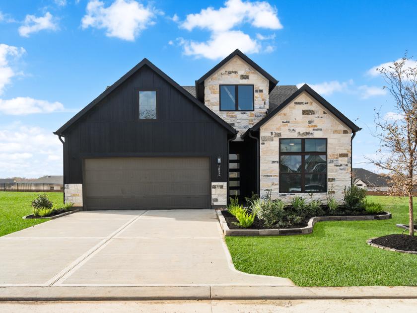 Beautiful exterior of Crossvine Farmhouse home