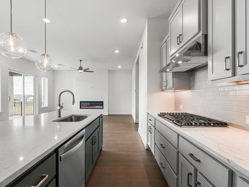Kitchen with designer-appointed finishes and premium stainless steel appliances