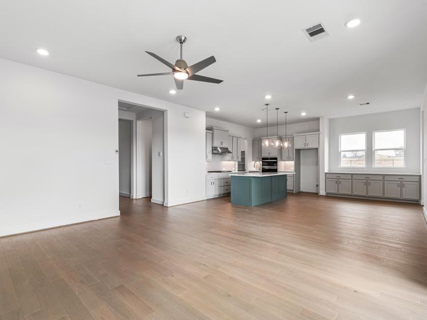 Gourmet kitchen with ample cabinet space and premium stainless steel appliances