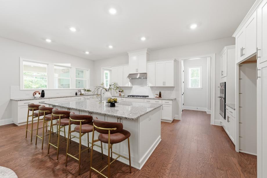 Gourmet kitchen with an expansive island and ample cabinetry