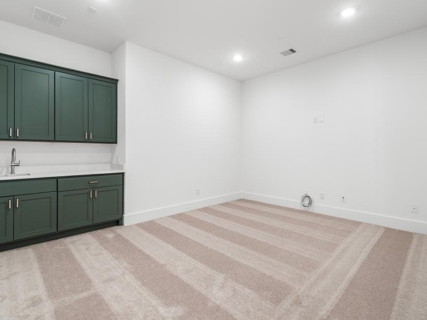 Second-story media room with built-ins