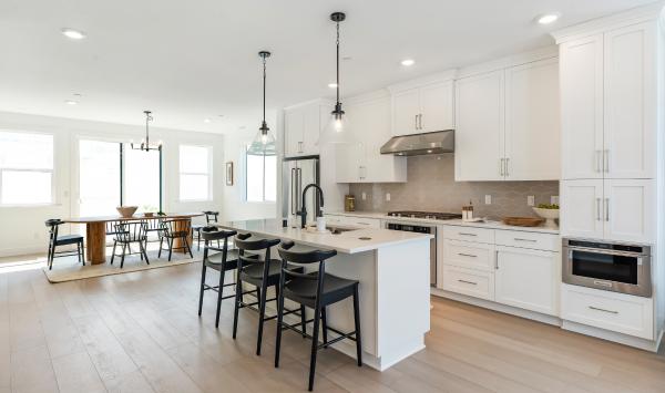 Open-concept kitchen overlooks the casual dining area