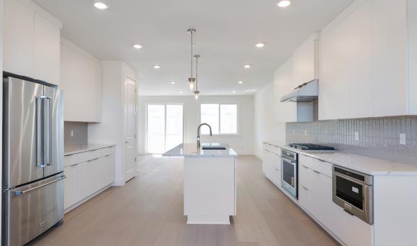 Well-appointed kitchen overlooks the great room
