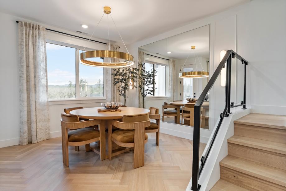 Representative Photo - Casual dining area with easy access to the covered deck