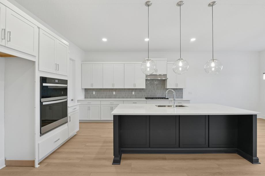 Well-equipped kitchen with beautiful cabinets and ample countertop space