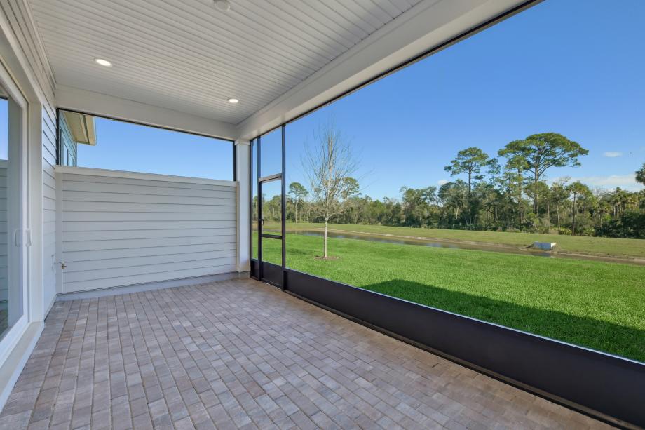 Covered lanai ideal for outdoor living, dining, and entertaining