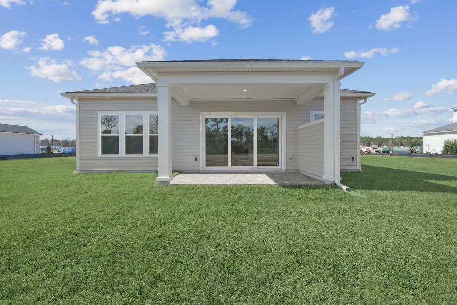 Spacious backyard and covered lanai for outdoor living