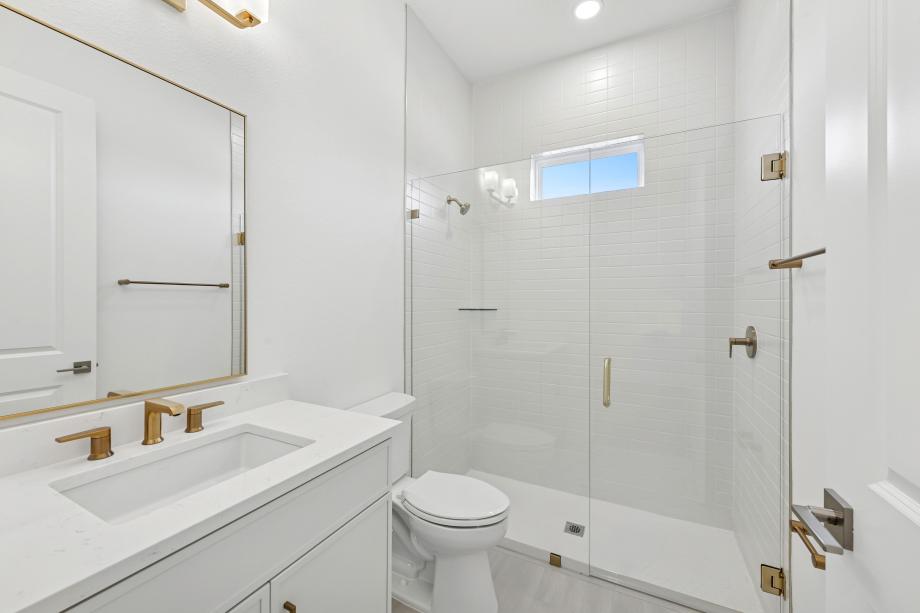 Secondary bathroom with beautiful walk-in shower