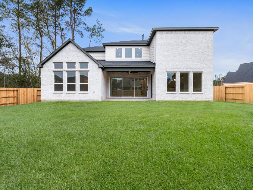 Backyard with covered patio ideal for indoor/outdoor living