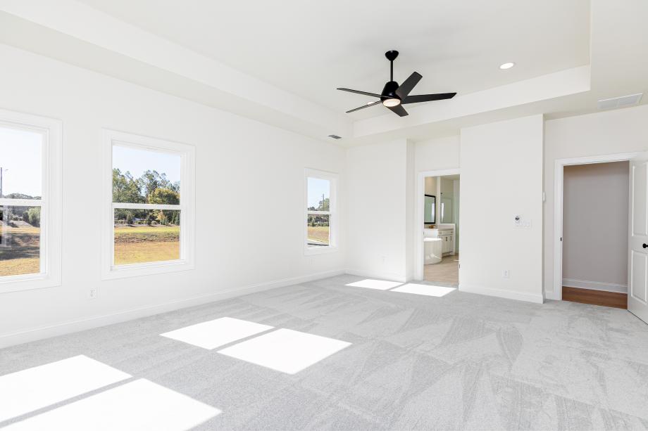 Spacious primary bedroom suite