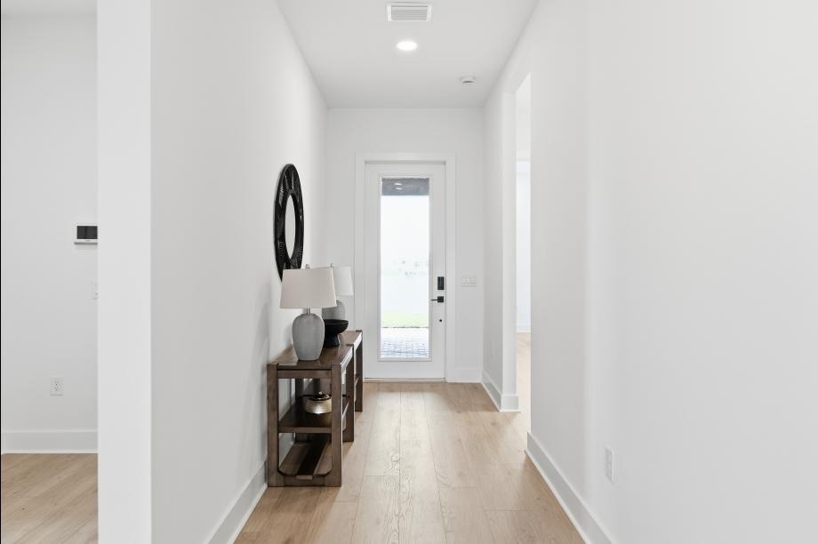 A bright and inviting foyer makes a stunning first impression