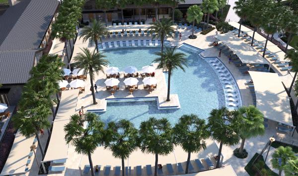 Beautifully designed pool retreat with expansive lounging areas and a true resort fee