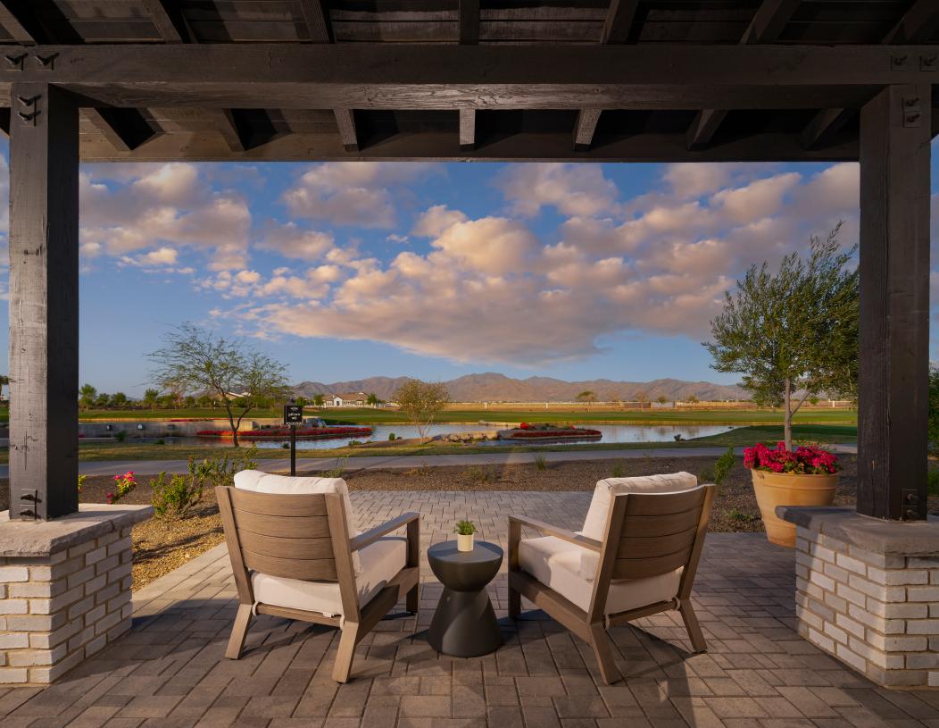 Charming covered porch overlooking the 6th hole of the Sterling Grove golf course