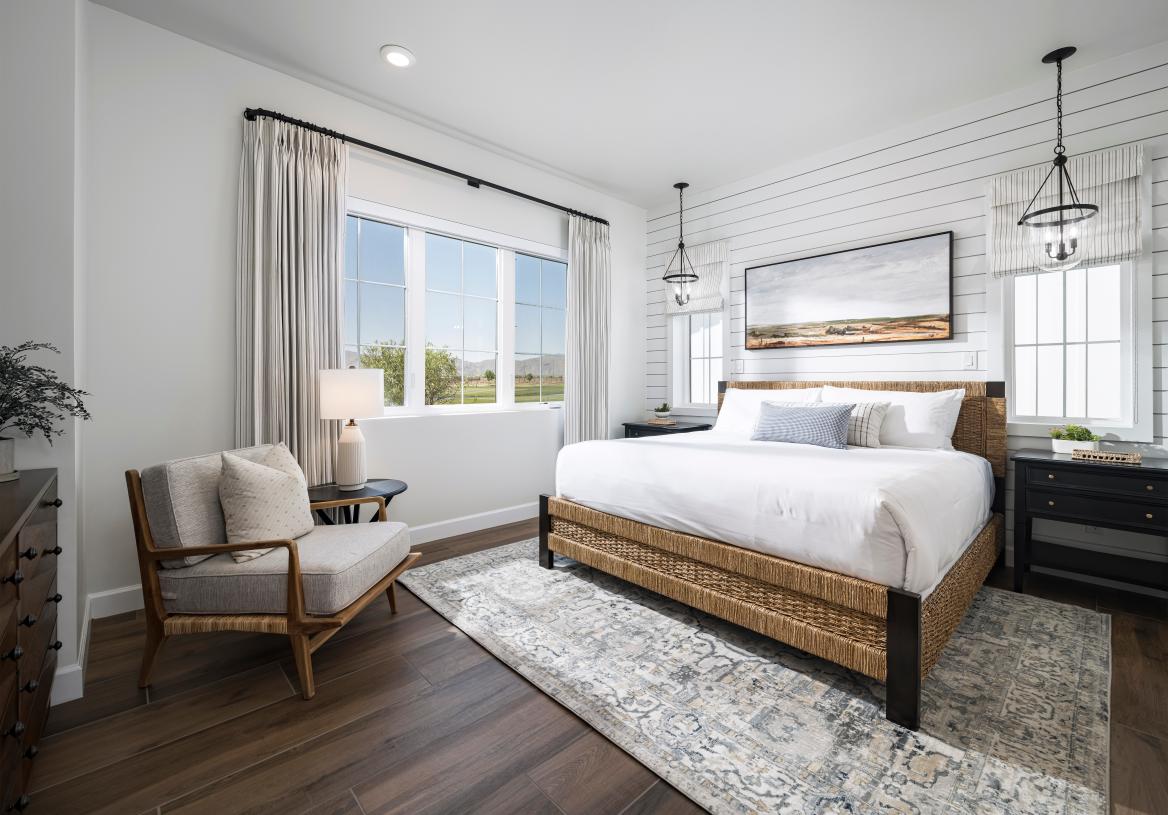 Serene primary bedroom with spa-like bath