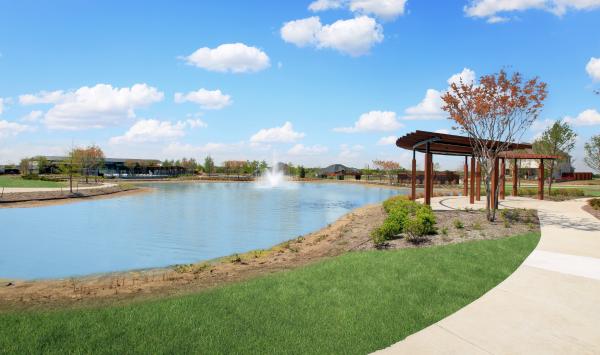 Walking trails with tranquil fountain views and shaded structures