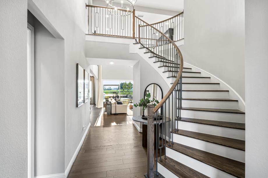 Entrance with curved staircase