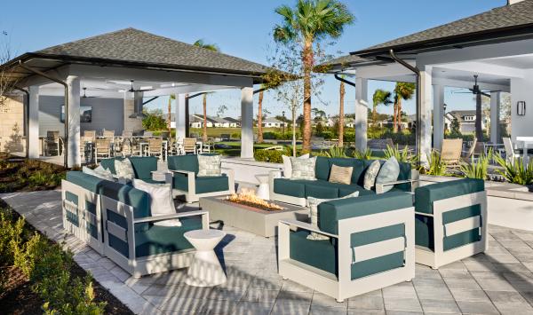 Inviting fire pit gathering spots and comfortable outdoor lounge spaces designed for relaxation and connection