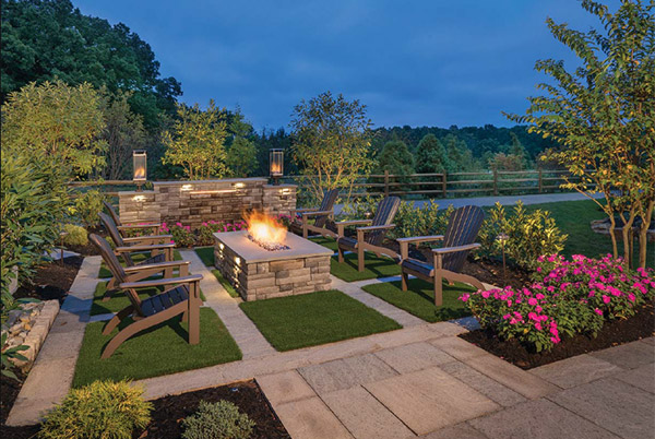 Stone patio with seating and fire pit