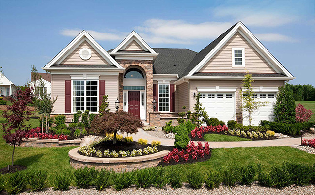 Landscape designer reviewing plans with a homeowner