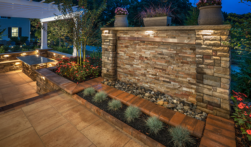 Landscape lighting highlighting garden features