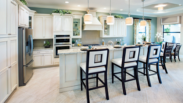Open kitchen with bar stool seating