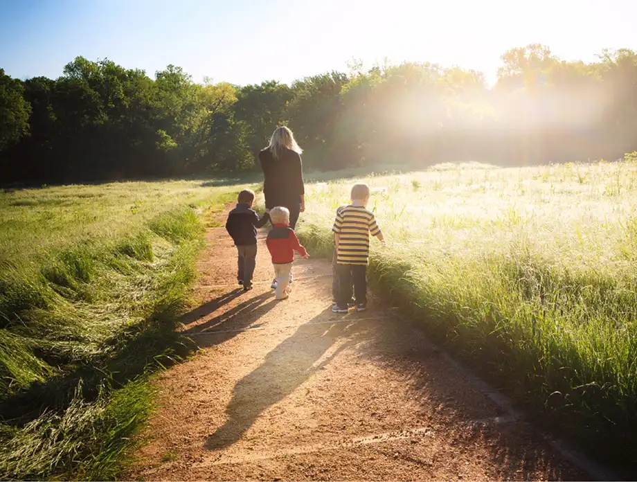Family walking on a trail